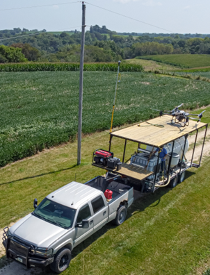 Drone crop fertilizer trailer setup